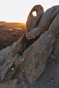Rock window formation at sunset in stone valley, the bear, Namibia