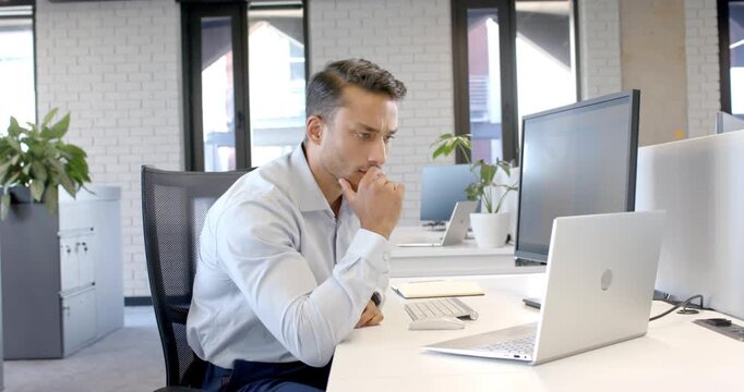 Lifestyle videos indoor of people doing activities at office, businessman concentrating on laptop sc