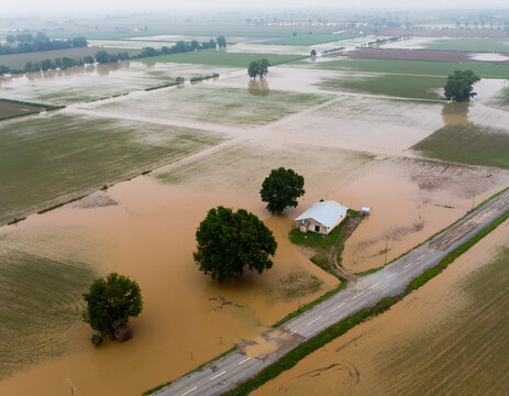 Aerial view overhead houses flooded by a cyclone