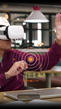 Vertical video: Man reaching in cafe, using HUD rings and DECODER to analyze attention for tech