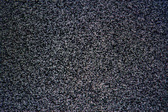  Analog television static noise filling CRT screen, abstract black and white interference texture