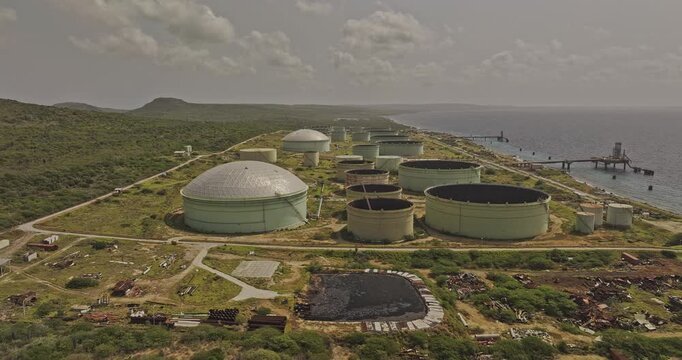 Bonaire Caribbean Netherlands Aerial v69 low flyover BOPEC terminal capturing industrial oil storage facilities along the shoreline with ocean views - Shot with 5k Camera - Feb 3rd 2024