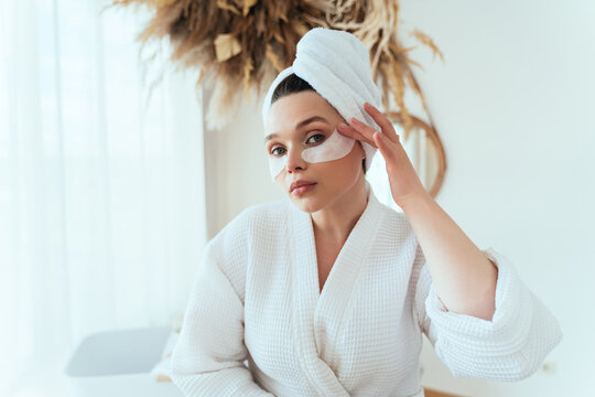 woman spending time in the bathroom taking care of herself