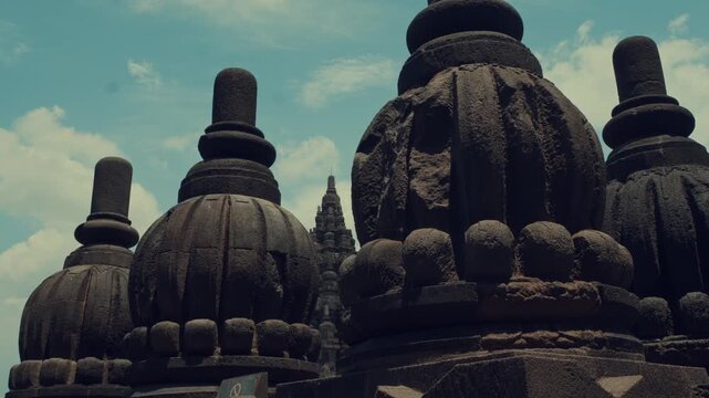 Backlit Silhouettes of Stone Stupas on Temple Terrace