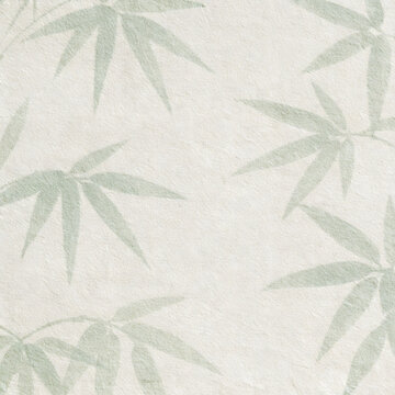 Soft watercolor bamboo leaves background on textured paper