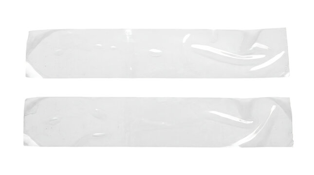 Two clear adhesive tape strips with wrinkled surfaces are displayed on transparent background tapes strip plastic cellulose film sticky seal fastener binding joining