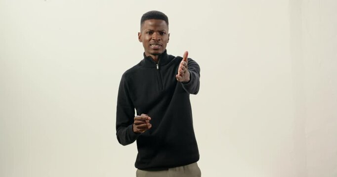 Close up of people talking to the camera, presenting with confidence, man in black sweater