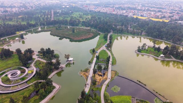 Aerial view of wetlands and tree-covered areas in CDMX