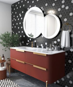 Contemporary, modern bathroom with terracotta red vanity, white marble top, overlapping round mirror on black and white hexagon mosaic tile wall in sunlight. Interior design decoration background 3D