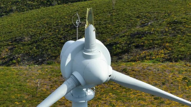 Broken wind turbine blade spinning in the wind