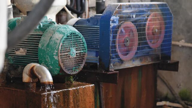 Industrial water pump system operating at a dairy farm, moving essential liquids