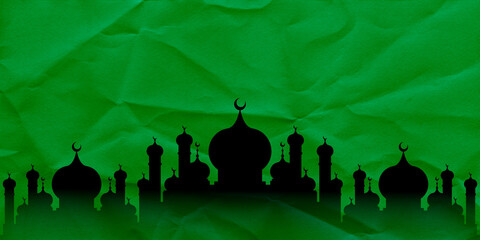 Black Mosque Silhouette Set on Green Crumpled Paper Background. Ideal For Islamic Holidays, Ramadan Greetings, Banner Designs and Cultural Event Posters. © RawAesthetic