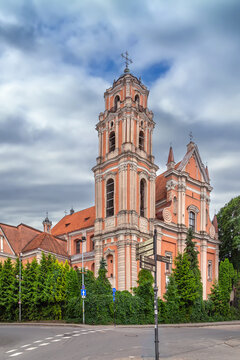 Church of All Saints in Vilnius, Lithuania, historic facade view. Baroque style architecture under bright daytime sky