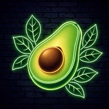 Bright green neon sign shaped like a fresh halved avocado with surrounding leaves against a dark brick wall