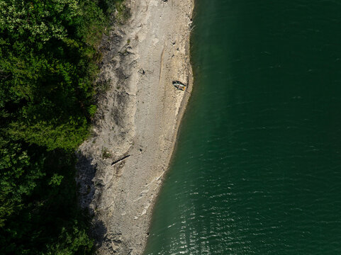 Aerial View of Sylvenstein Reservoir with Low Water Levels During Summer Drought, Bavaria, Germany