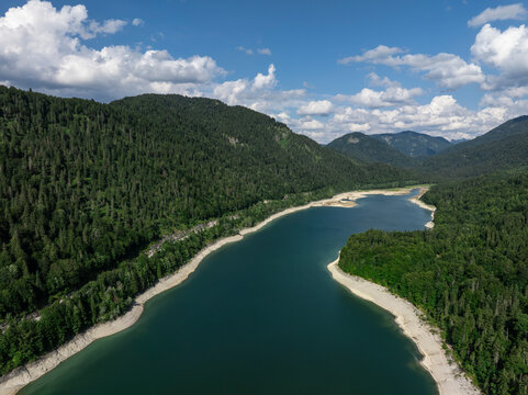 Aerial View of Sylvenstein Reservoir with Low Water Levels During Summer Drought, Bavaria, Germany