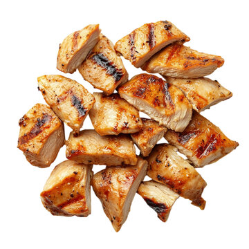Grilled chicken breast pieces, golden browned roasted poultry meat chunks with seasoning, high protein meal ingredient isolated on Transparent Background