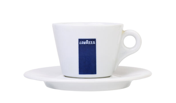 White Lavazza espresso cup with saucer on white background.