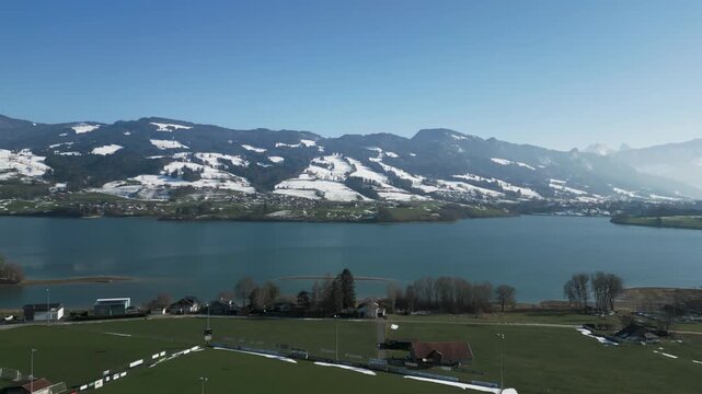 Aerial push in on the Lake of Gruy&egrave;re in Switzerland