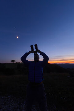 Amateur astronomer observing stars, planets and other celestial objects.