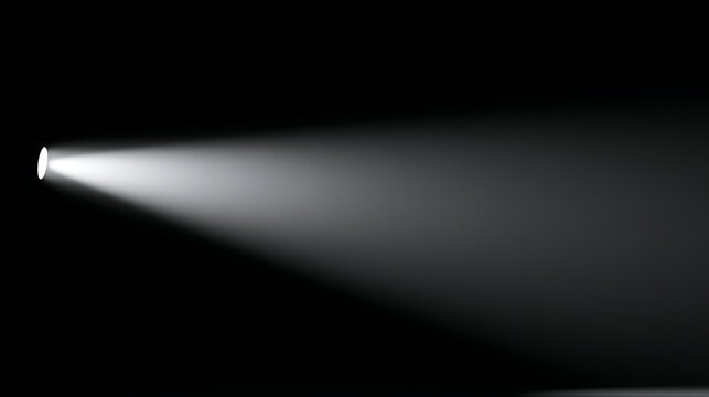 Bright flashlight beam illuminates darkness creating a dramatic spotlight effect against a black background