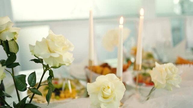 Catering service on banquet table with canape snacks in restaurant or hotel. Decorated food set on birthday, wedding celebration or business conference event venue.