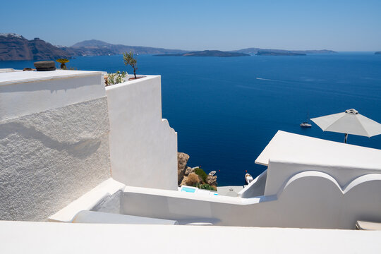 White architecture in Santorini island, Greece. Blue sea and the blue sky at sunny day.