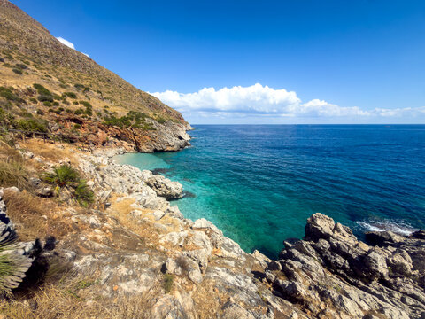 View of the rugged coastline and turquoise waters of Riserva Naturale Orientata dello Zingaro, Scopello, Sicily, Italy.