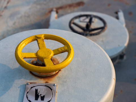 View of circular metal hatches with handwheels at the War Memorial of Korea in Seoul, South Korea.