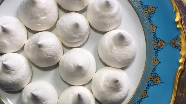 Eastern sweets on a beautiful golden plate are expresse