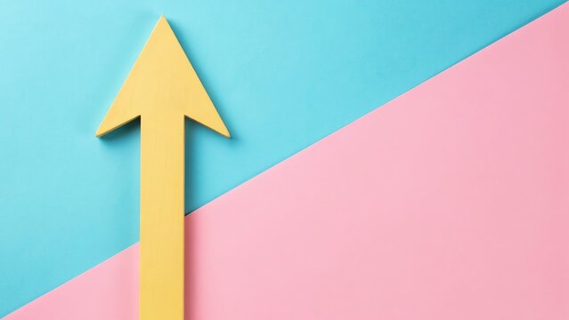 A single yellow arrow pointing upwards, placed on a surface divided diagonally into two sections, with a light blue color on the left and a soft pink color on the right