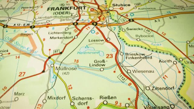 road network leading to frankfurt (oder), germany &ndash; gliding view over detailed atlas map