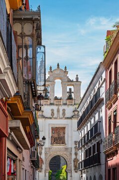 An entrance to the Seville Cathedral of the Saint Mary of the Sea, Spain, captured on a sunny day