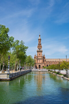 An incredible architectural beauty of the towers of the Plaza de Espana, captured on a sunny day, located in Seville, Spain
