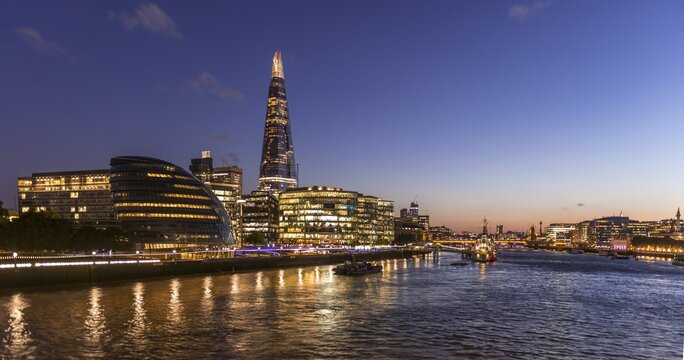 River Thames and modern high-rise buildingss, More London Riverside in the evening, The Shard and Greater London Auditory, London, England, Great Britain