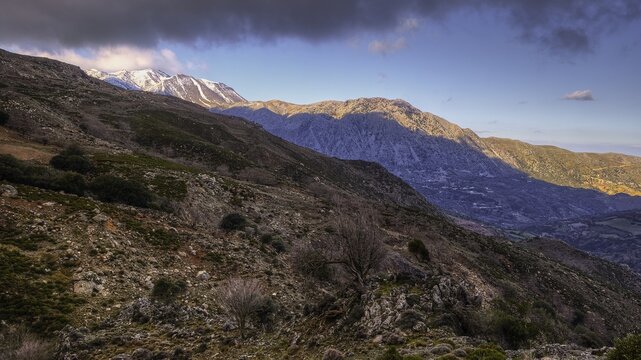 View of snow-covered mountain peaks at dusk with illuminated sky, Kallikratis, Kallikratis Gorge, Sfakia, West Crete, Crete, Greek Islands, Greece