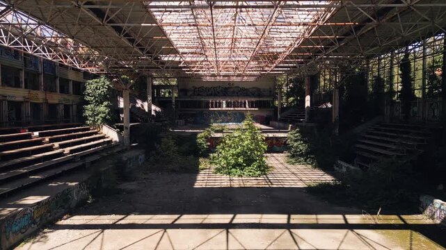 Abandoned unfinished building or warehouse complex with steel roof frame