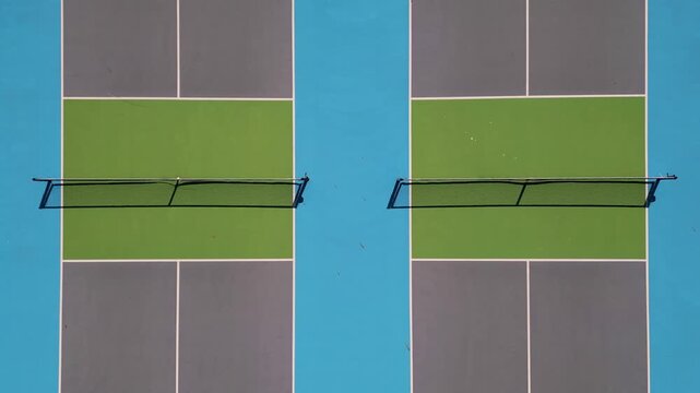 Aerial top down view of pickleball or tennis courts with nets and surface lines