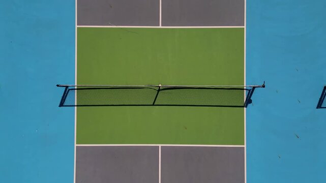 Aerial top down view of pickleball or tennis courts with nets and surface lines