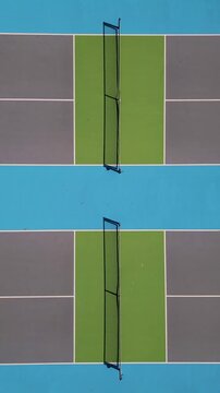 Aerial top down view of pickleball or tennis courts with nets and surface lines
