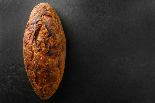 sourdough bread on a black background