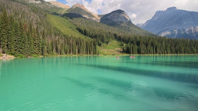 Summer travel at Emerald Lake in Yoho National Park, British Columbia, Canada, with canoes by lake and mountains by aerial view. Ideal for tourism, vacation, outdoor recreation and adventure.