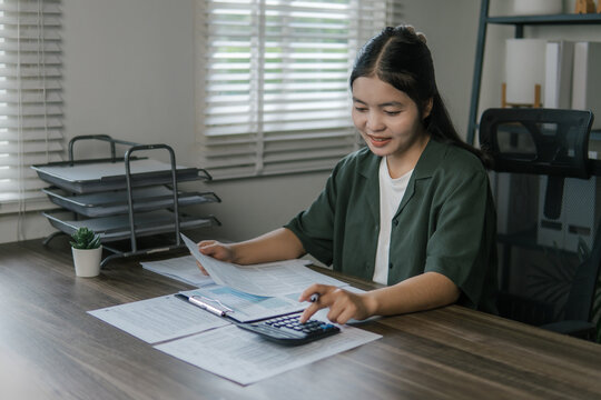 The concept of tax return preparation and financial management. Businessman calculates taxes. finance, Income tax, tax documents, and savings.