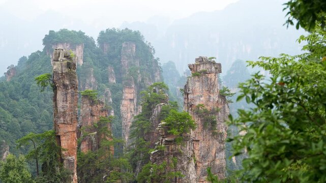 Misty sandstone pillars in Zhangjiajie National Forest Park