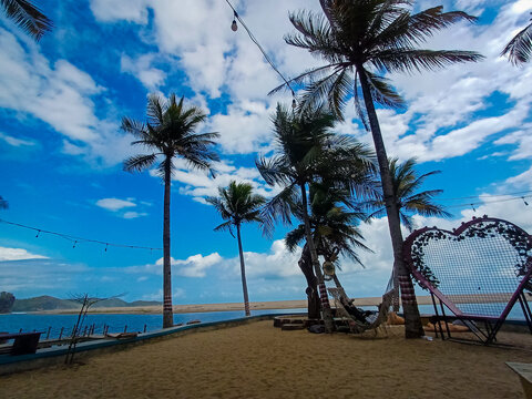 Pancer Door Beach Pacitan Tropical Resort with Palm Trees Hammock and Heart Frame Indonesia Travel Photography