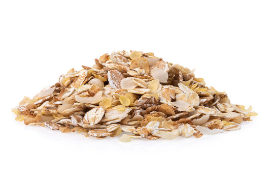 Heap of seven cereal flakes isolated on white background