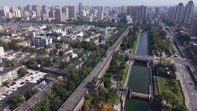 Aerial drone footage of the Great Wall of Xi'an in Shaanxi, China, on a sunny day, 1-inch sensor