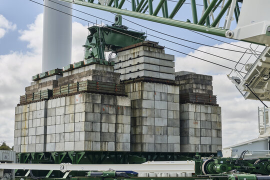 Thisted, Denmark - 11 August 2026: View of the massive 3000-ton electric ring crane counterweight at the National Test Center for Large Wind Turbines, featuring stacked concrete blocks.