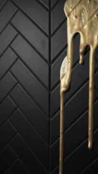 Luxurious Gold Paint Drips Over Modern Matte Black Herringbone Tile Texture Background for Elegant Interior Design Projects
