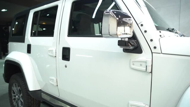 White Car Front Headlight and Bumper Close Up